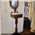 F31. Eastlake marble top shaving stand. 